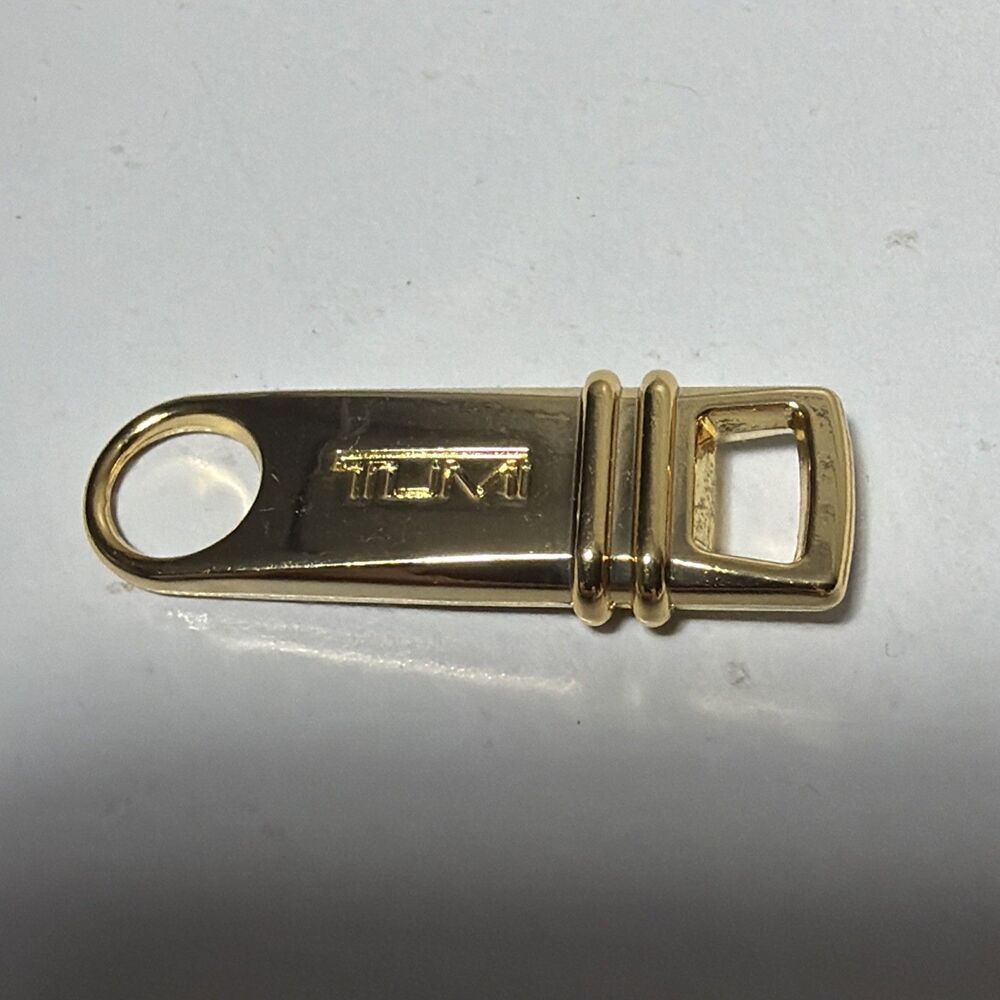 Tumi Premium Brass Goldtone Zipper Pull Tab Genuine Replacement Used